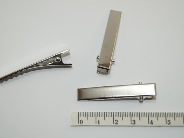 Затискач металевий 4,5 см. - Купити