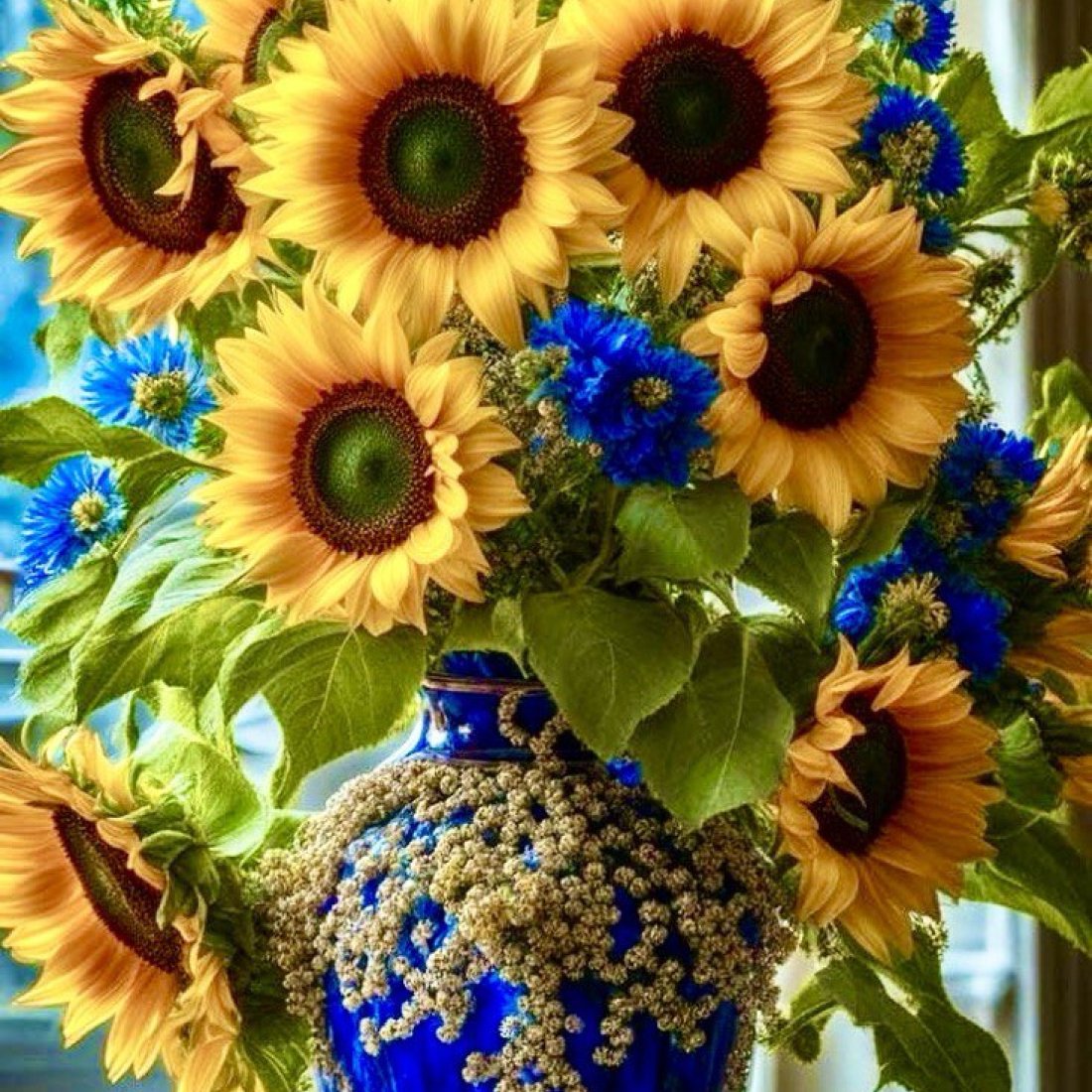 Подсолнухи в вазе 40х50