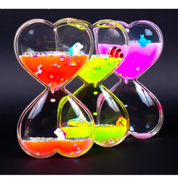 Гелевий годинник Серця з рибками 13 см - Купити