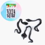 Лізун-антистрес Змії чорні на палетці 16 см