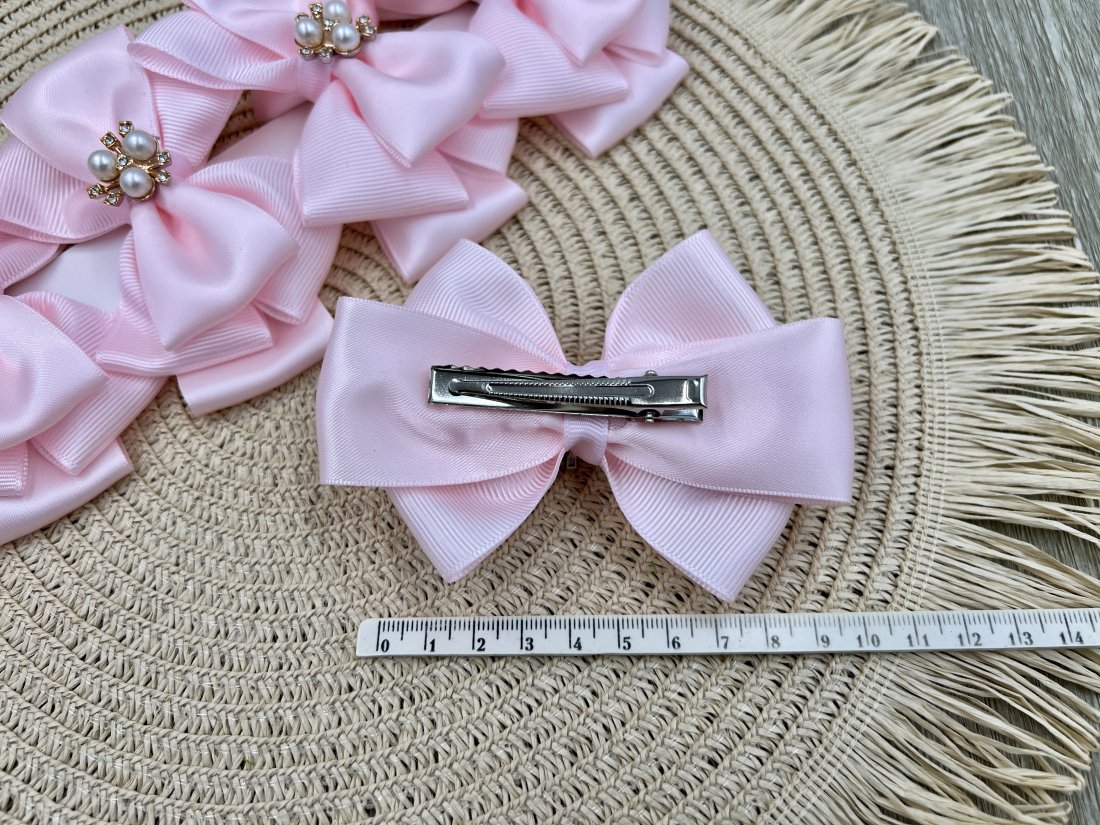 Бантики на затиску рожевий. - Купити