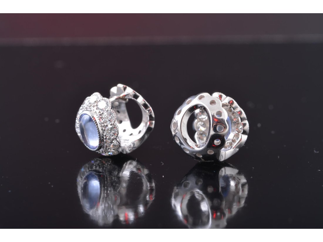 Сережки із топазами та діамантами