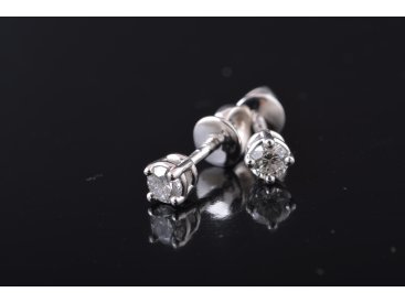 Сережки із діамантами на закрутках - Купити