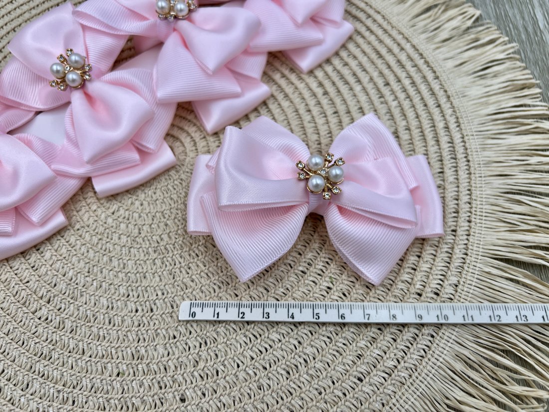 Бантики на затиску рожевий. - Кристалік