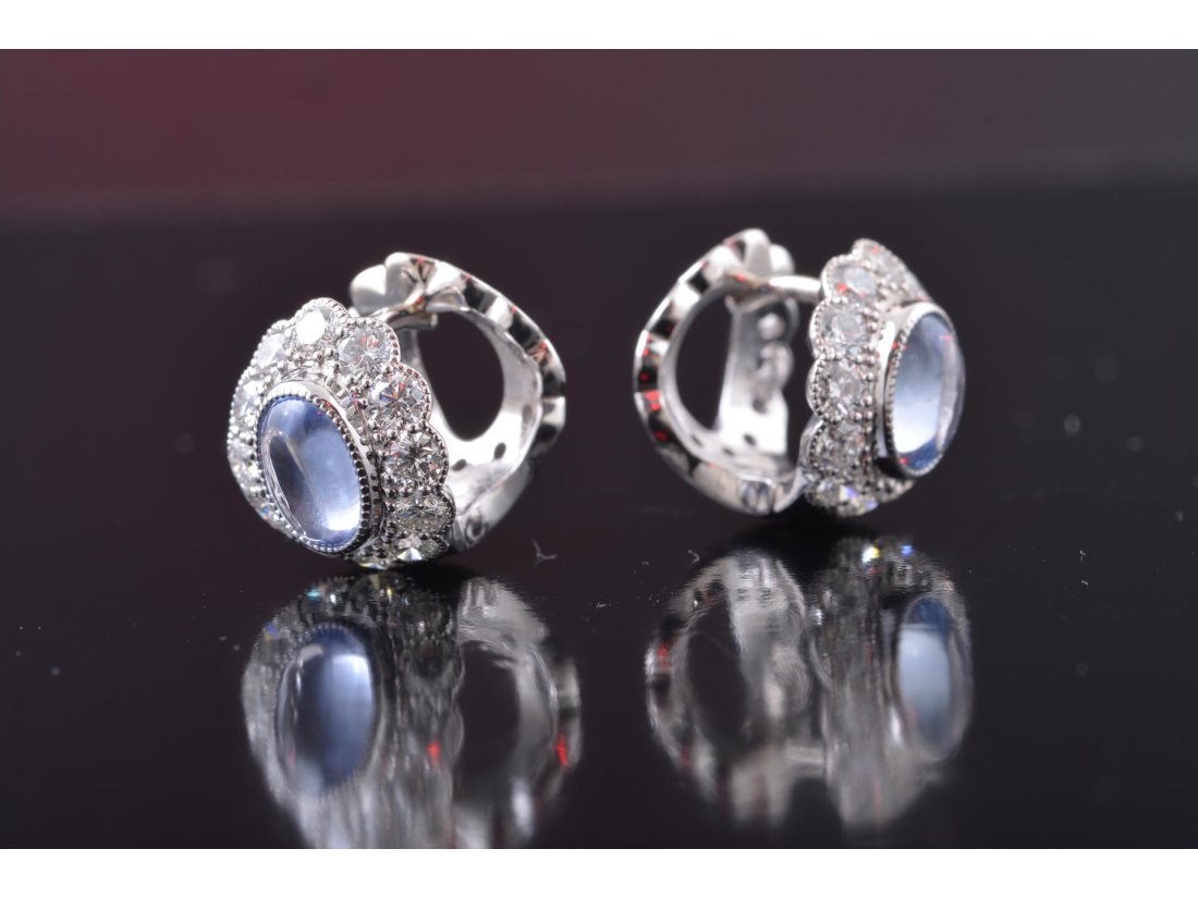 Сережки із топазами та діамантами