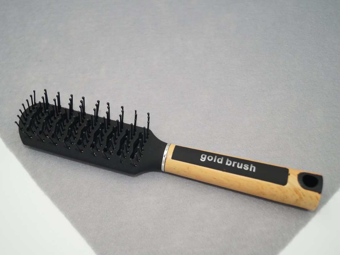 Масажна щітка для волосся