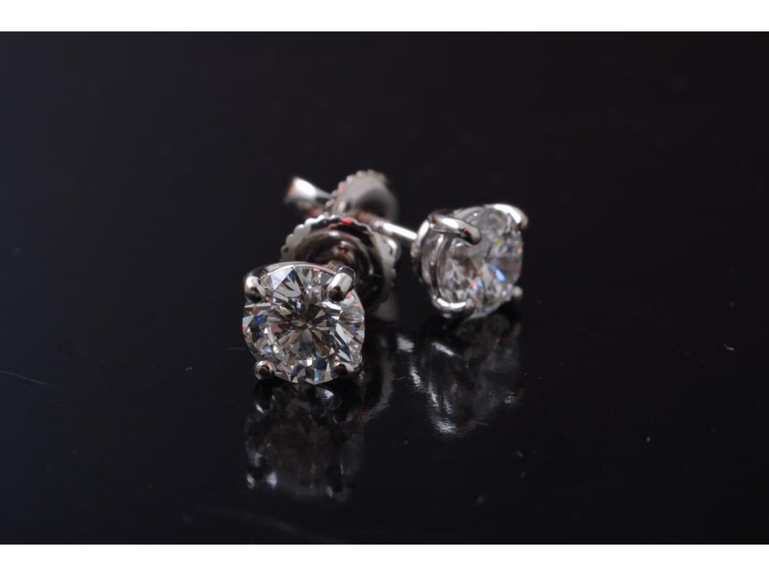 Сережки жіночі на закрутках із діамантами - Фото1 Сережки жіночі на закрутках із діамантами