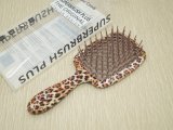 Гребінець для волосся в коробочці. Глянець леопард.