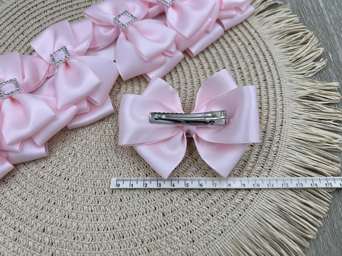 Бантики на затиску рожевий - Купити