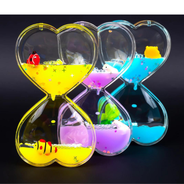 Гелевий годинник Серця з рибками 13 см - Купити